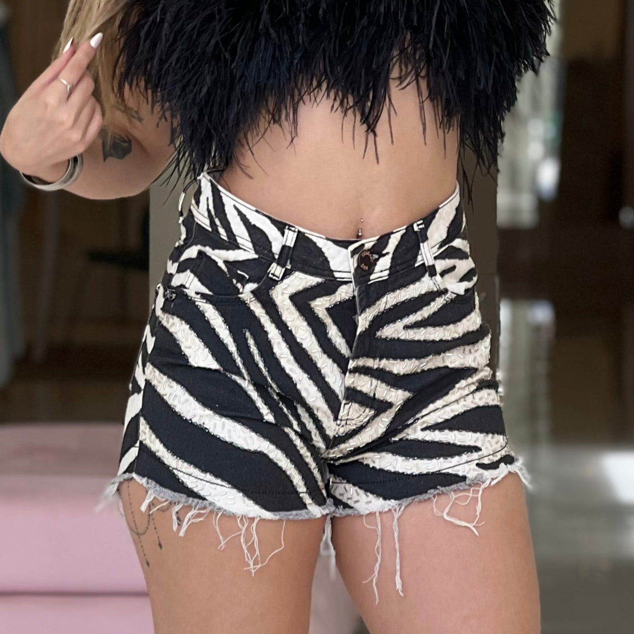 Degrant animal print short featuring intricate embroidery in a stylish design, perfect for casual wear.