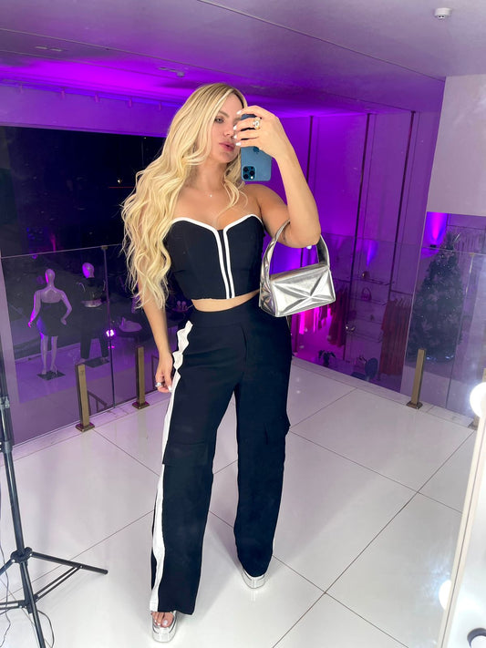 Bicolor pants with pockets in black and white by Wanessa Lopez Concept, featuring a stylish design and comfortable fit.