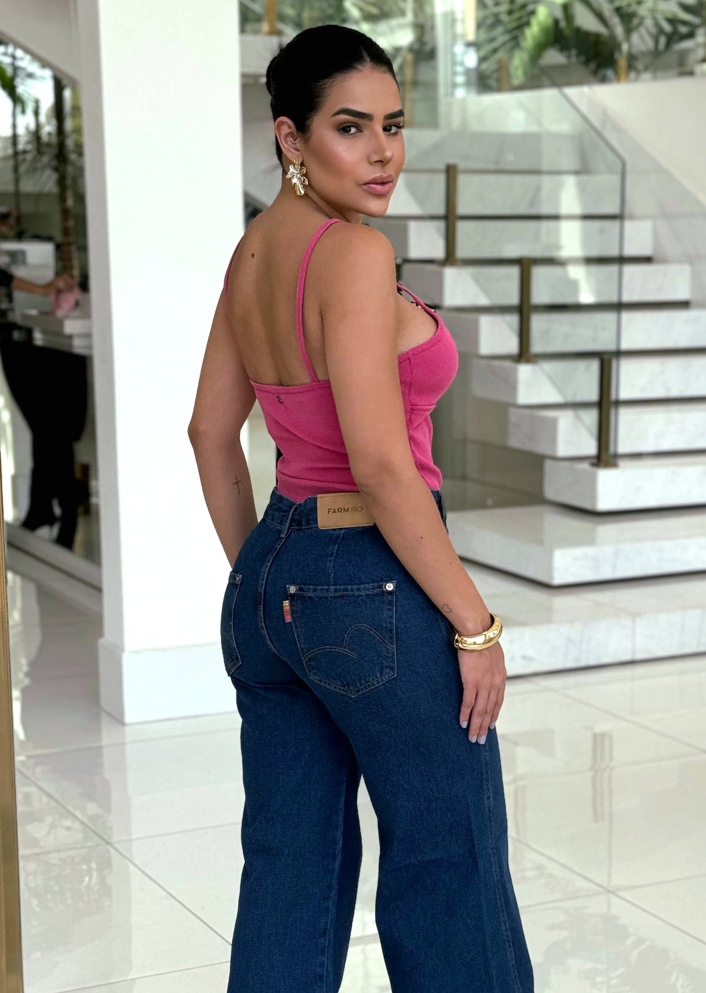 Wanessa Lopez Concept ribbed tank top with a deep neckline and side openings in a stylish design.