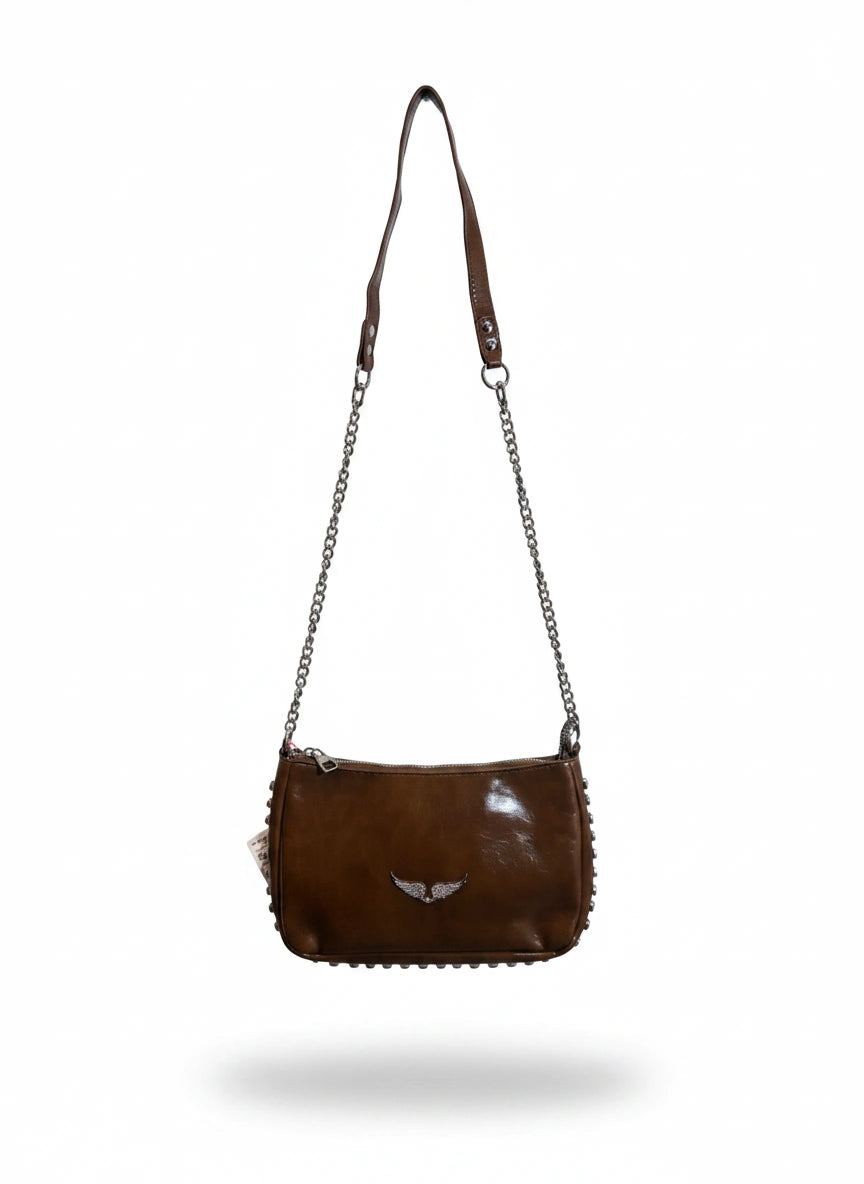 Bolsa feminina de couro ecológico com cristais, estilo elegante, da marca Wanessa Lopez Concept, vista lateral com detalhes brilhantes
