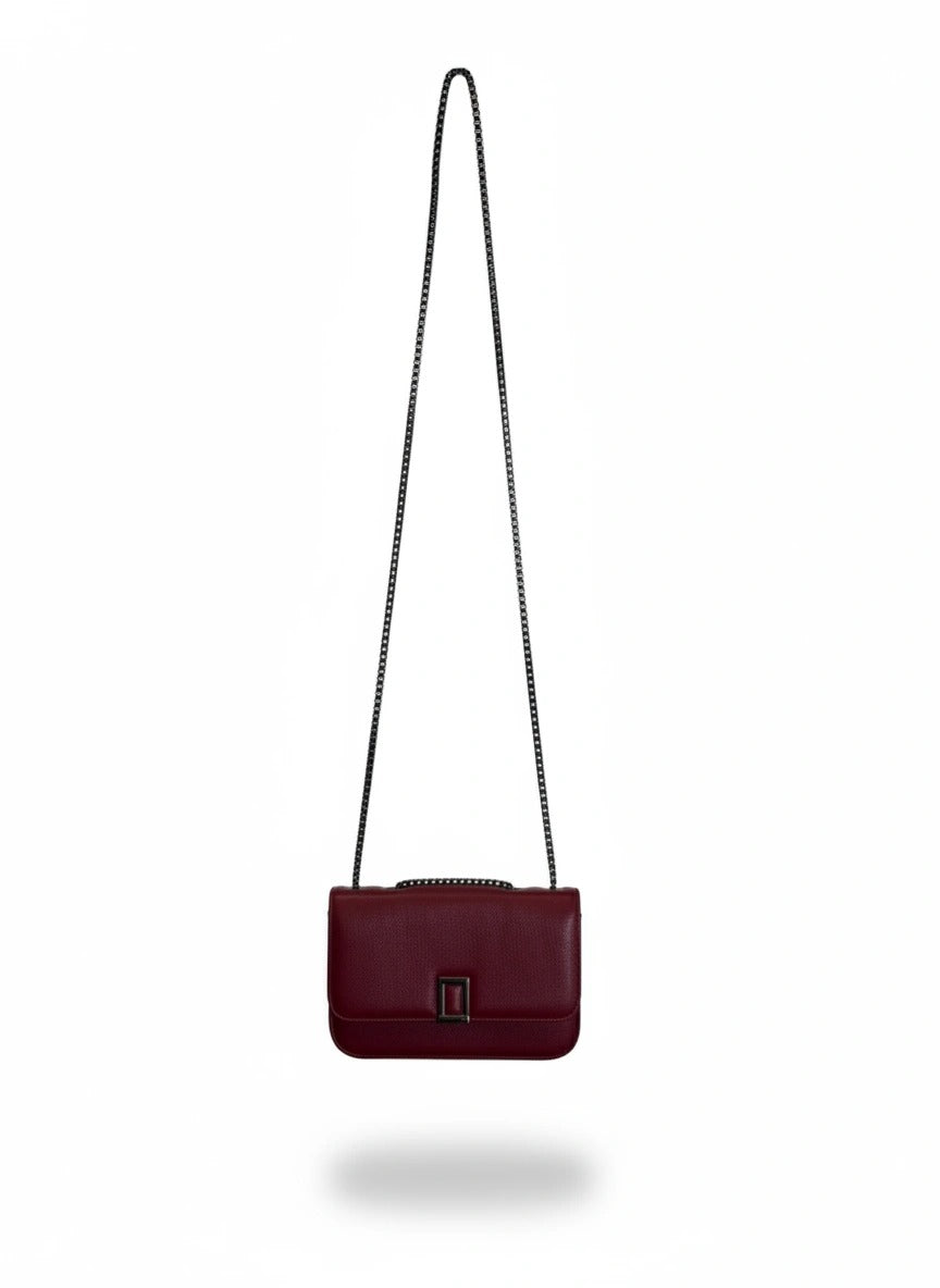 Bolsa feminina Jessy da Wanessa Lopez Concept, com design elegante e detalhes em couro, vista de lado sobre fundo neutro.