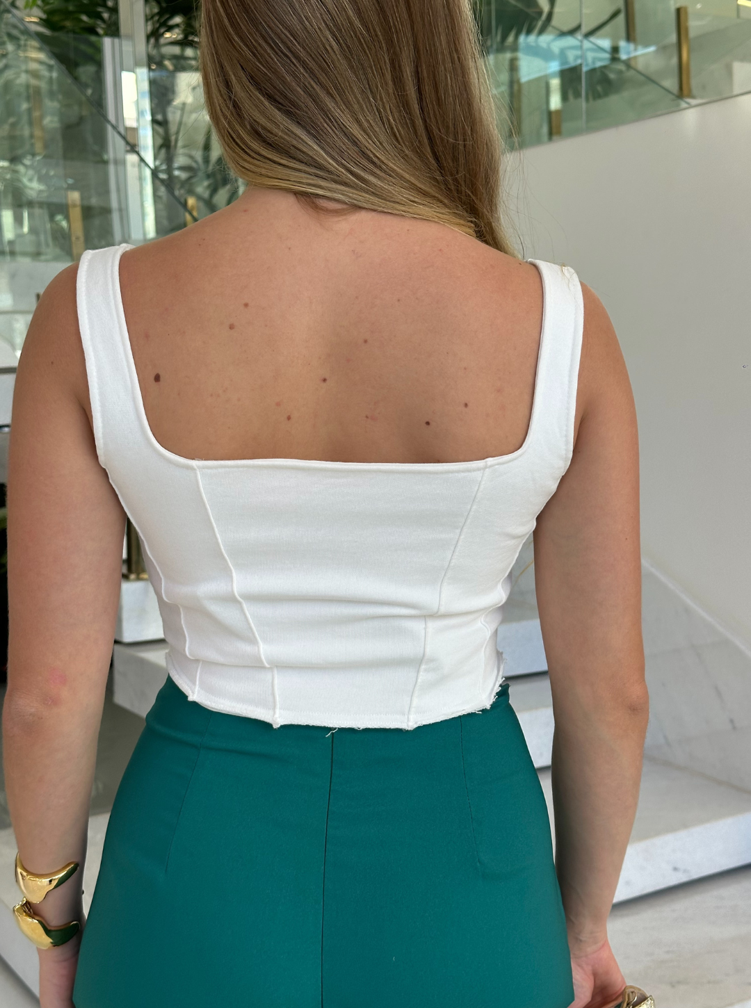 Cropped corse from FARM featuring a stylish design and comfortable fit, showcasing the fabric and details.