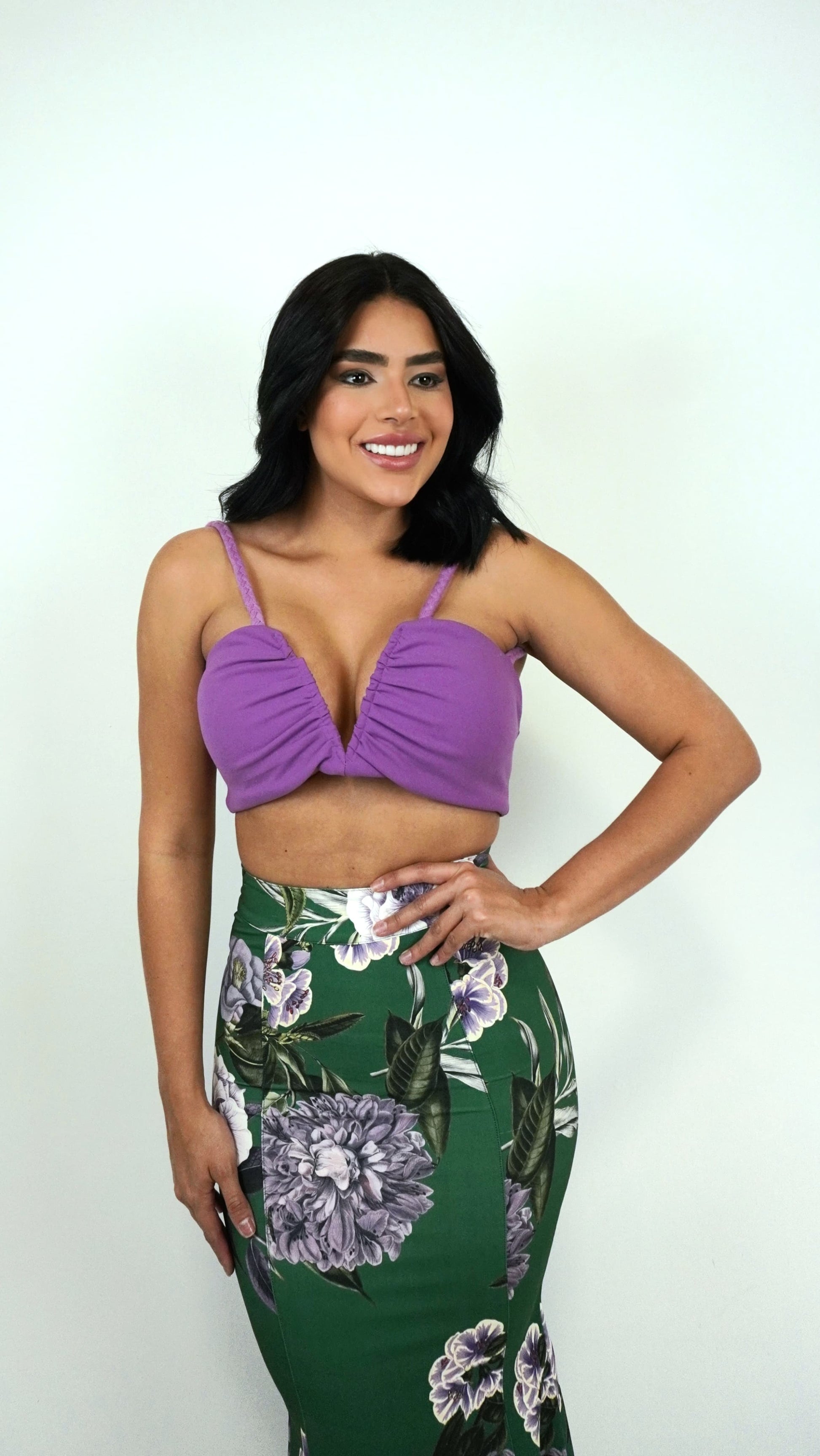 Long floral skirt by Wanessa Lopez Concept, featuring a vibrant pattern and flowing design, perfect for warm weather.
