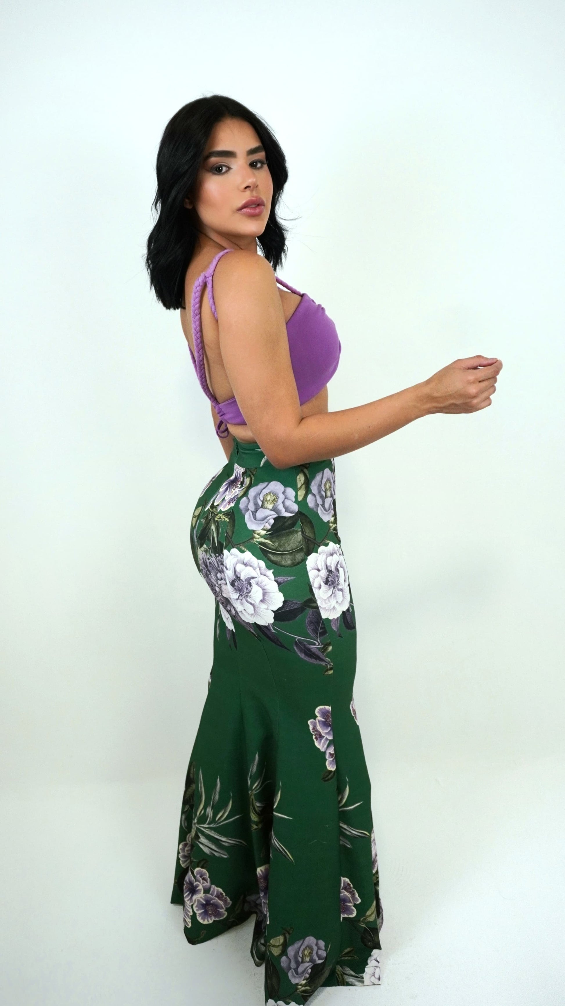 Long floral skirt by Wanessa Lopez Concept, featuring a vibrant pattern and flowing design suitable for various occasions.