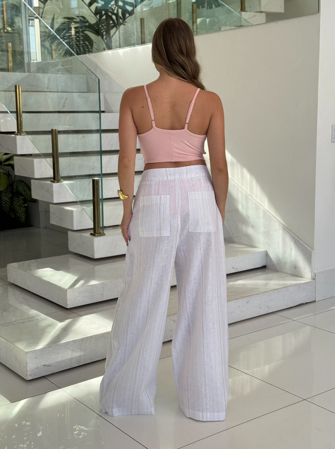 Corpo feminino roxo da marca Lopz, modelo Body Concha do Mar, com detalhes suaves e design moderno.