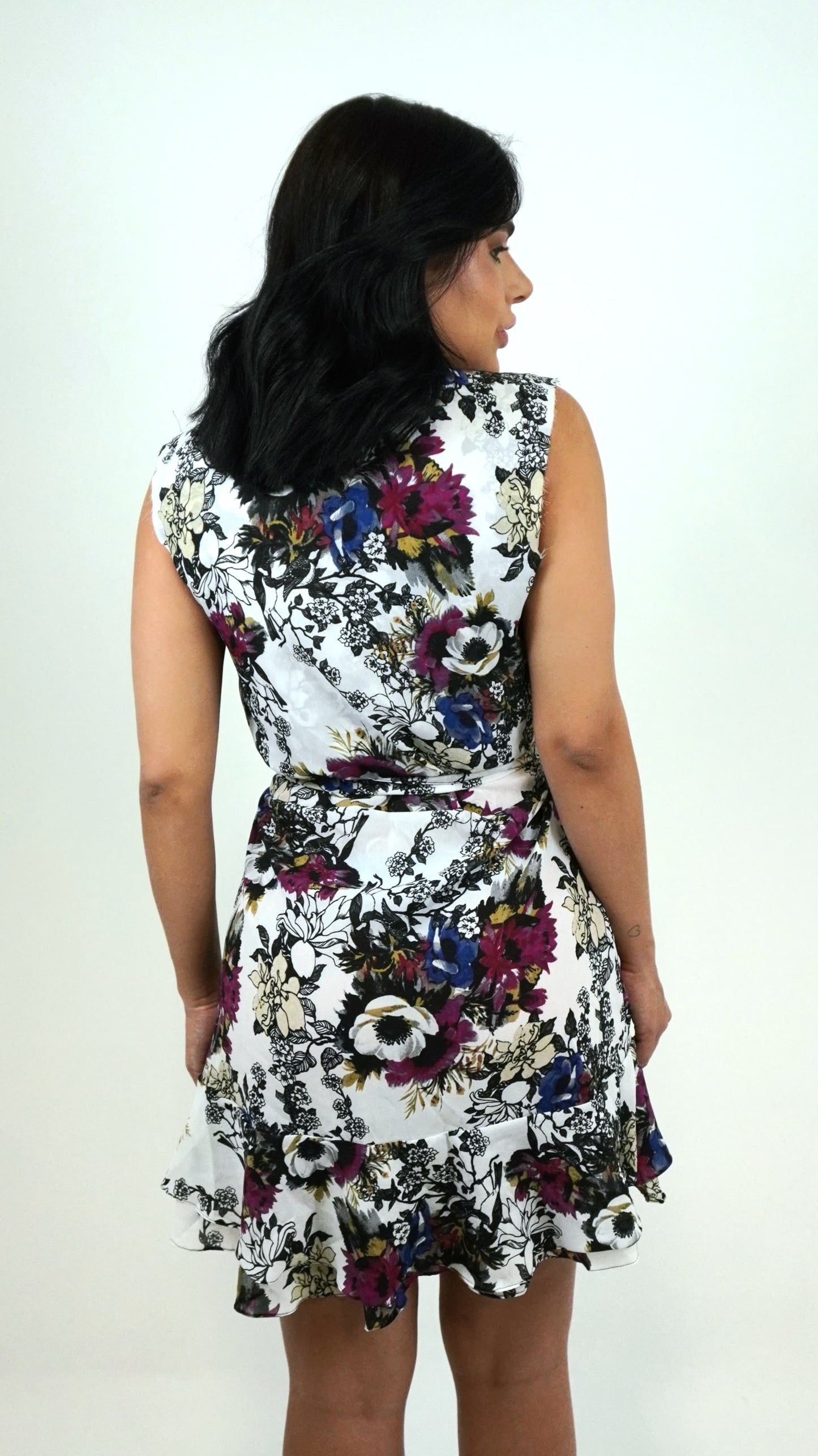 Wanessa Lopez Concept floral dress with vibrant colors and a flowy silhouette, perfect for casual or semi-formal occasions.