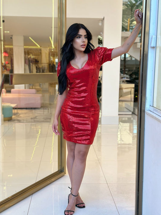 Vestido Lopz de paetê preto com manga bufante, detalhes elegantes e estilo sofisticado para ocasiões especiais.