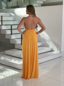 Elegant Wanessa Lopez Concept Andara Glan vestido in soft fabric, showcasing a flowing silhouette and vibrant color.